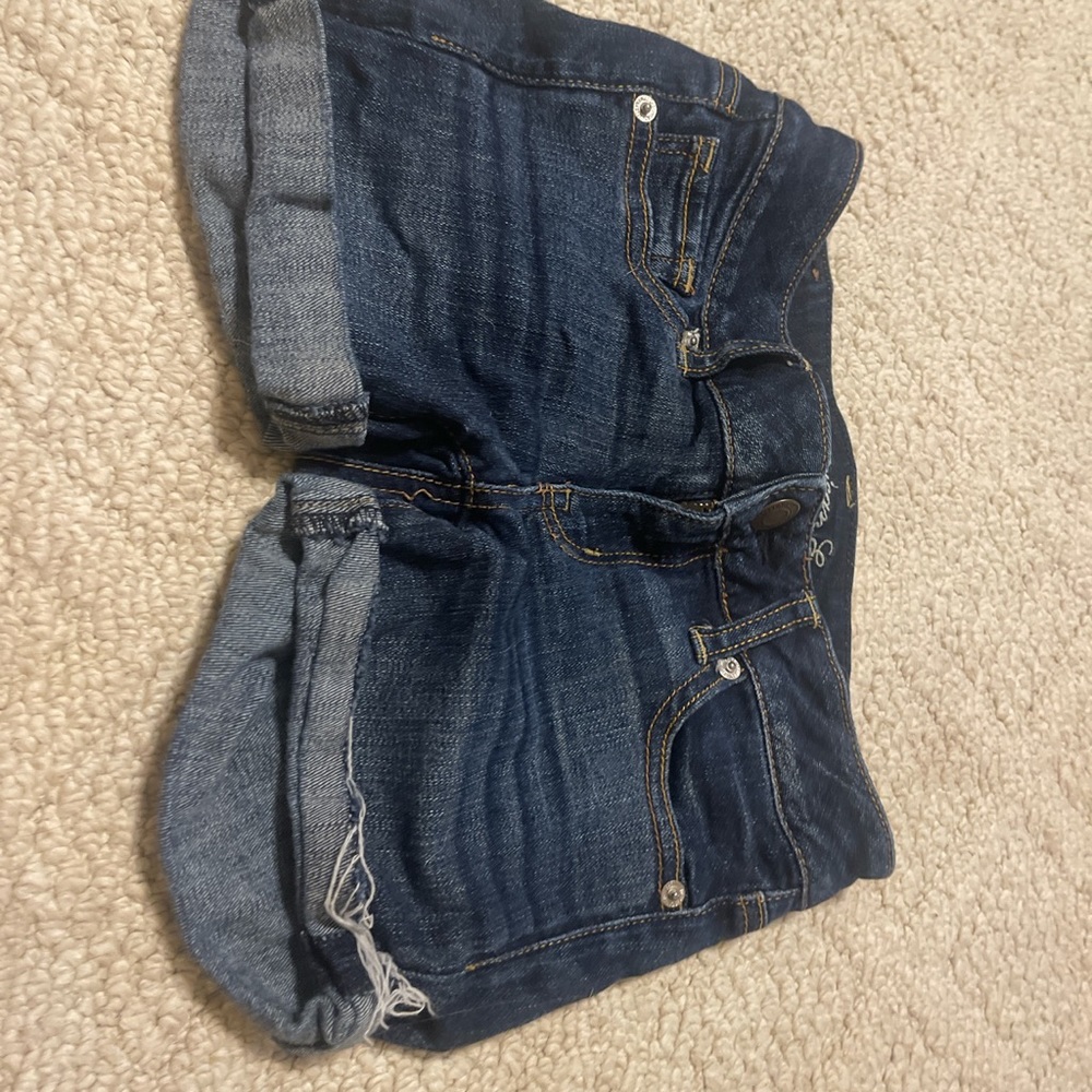 American eagle MIDI rise Size 0 In great condition with minor signs of wear